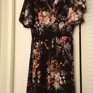 Woman's summer dress by Temu Navy blue with flower pattern. Comfy elastic waist